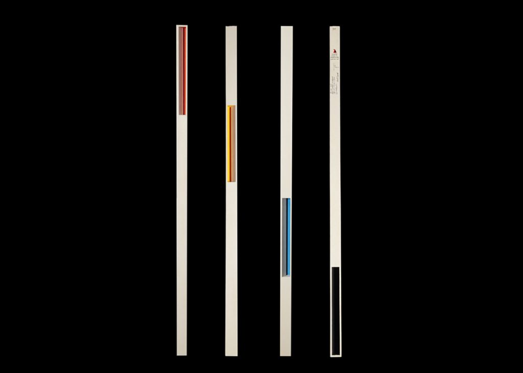 Black background. In the middle, four white lines. In each line is a smaller line made from a colourful gradient - one red, one yellow, one blue and one black.